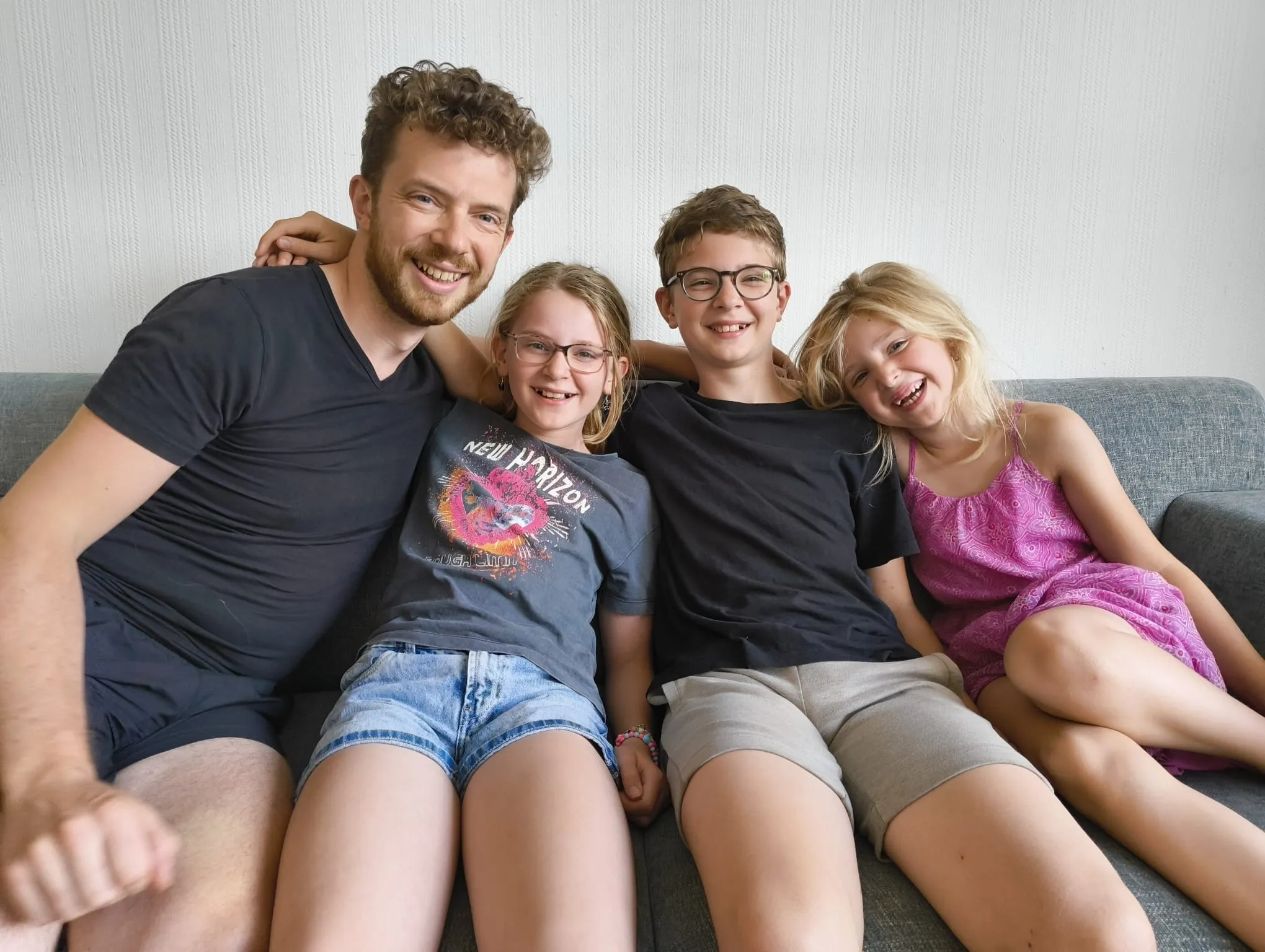 Eric Gipon at home with his children